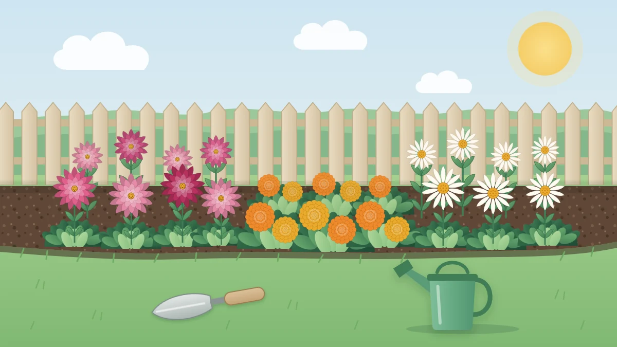 A small sunny flower bed along a low fence with pink zinnias, orange marigolds and white daisies, beside a trowel and watering can